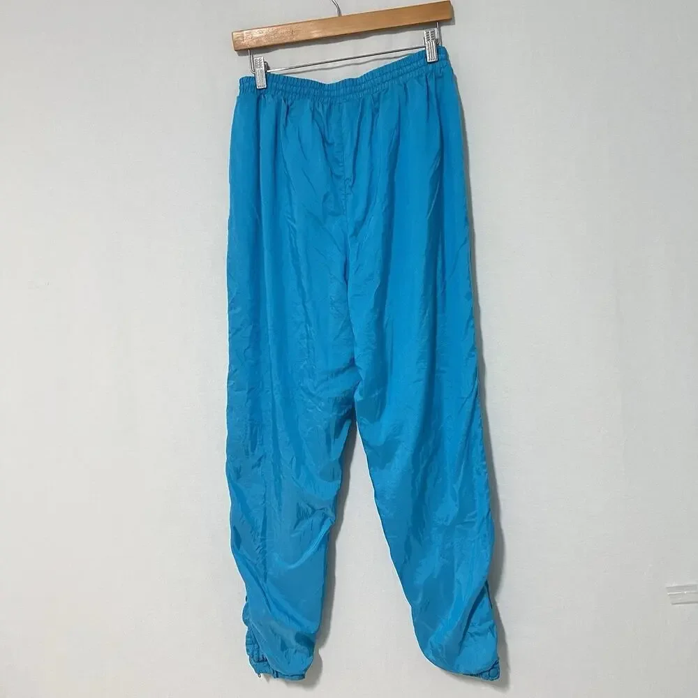 Vintage Nike Women’s Teal Nylon Windbreaker Track Pants Size L Lined 90’s